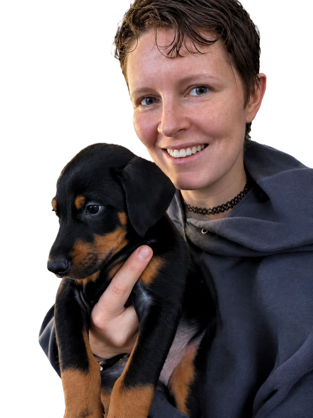 Amy Arthur holding a Doberman puppy Amy Arthur holding a Doberman puppy